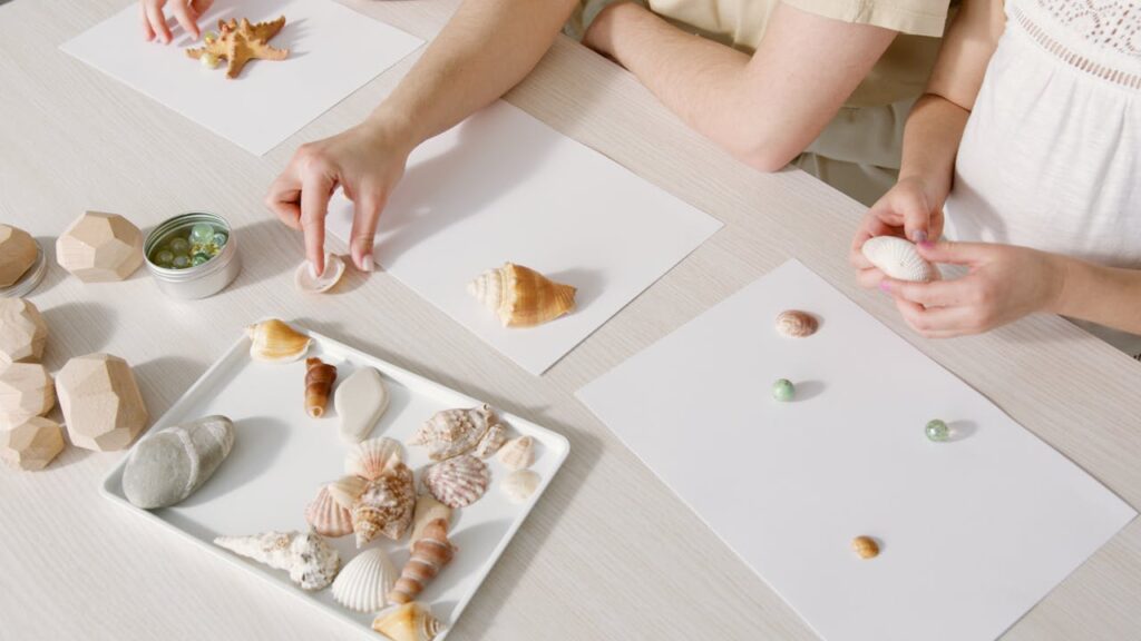 Child engaging in tailored creative activity with a professional nanny in a luxury resort